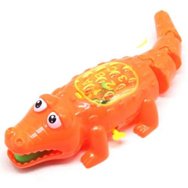 Заводна іграшка Крокодил, 31 см (помаранчевий)