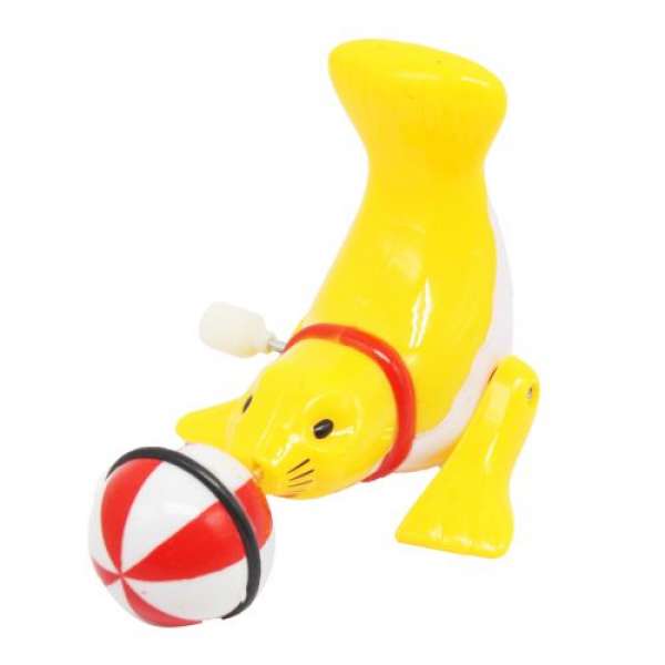 Заводна іграшка Тюлень з мʼячиком, жовта